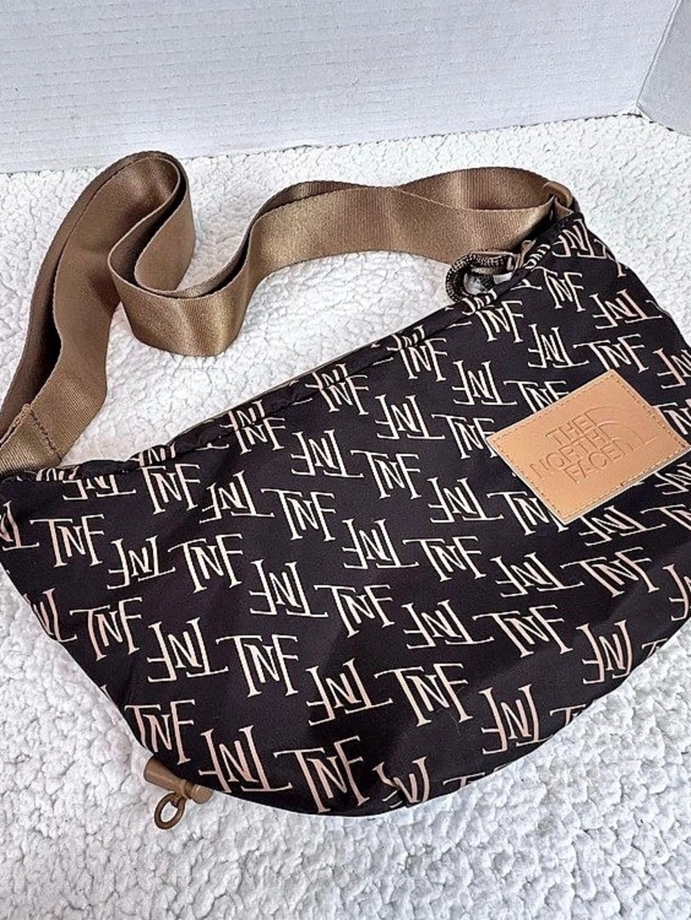 The North Face Never Stop Crossbody Bag Brown TNF Monogram Print Sling NF0A81DS
